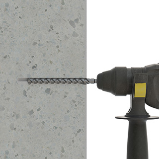 Step 1 perforation of concrete with hammer drill