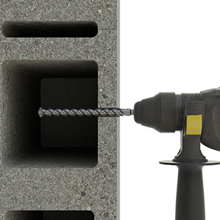 Step 1 perforation of hollow concrete with hammer drill